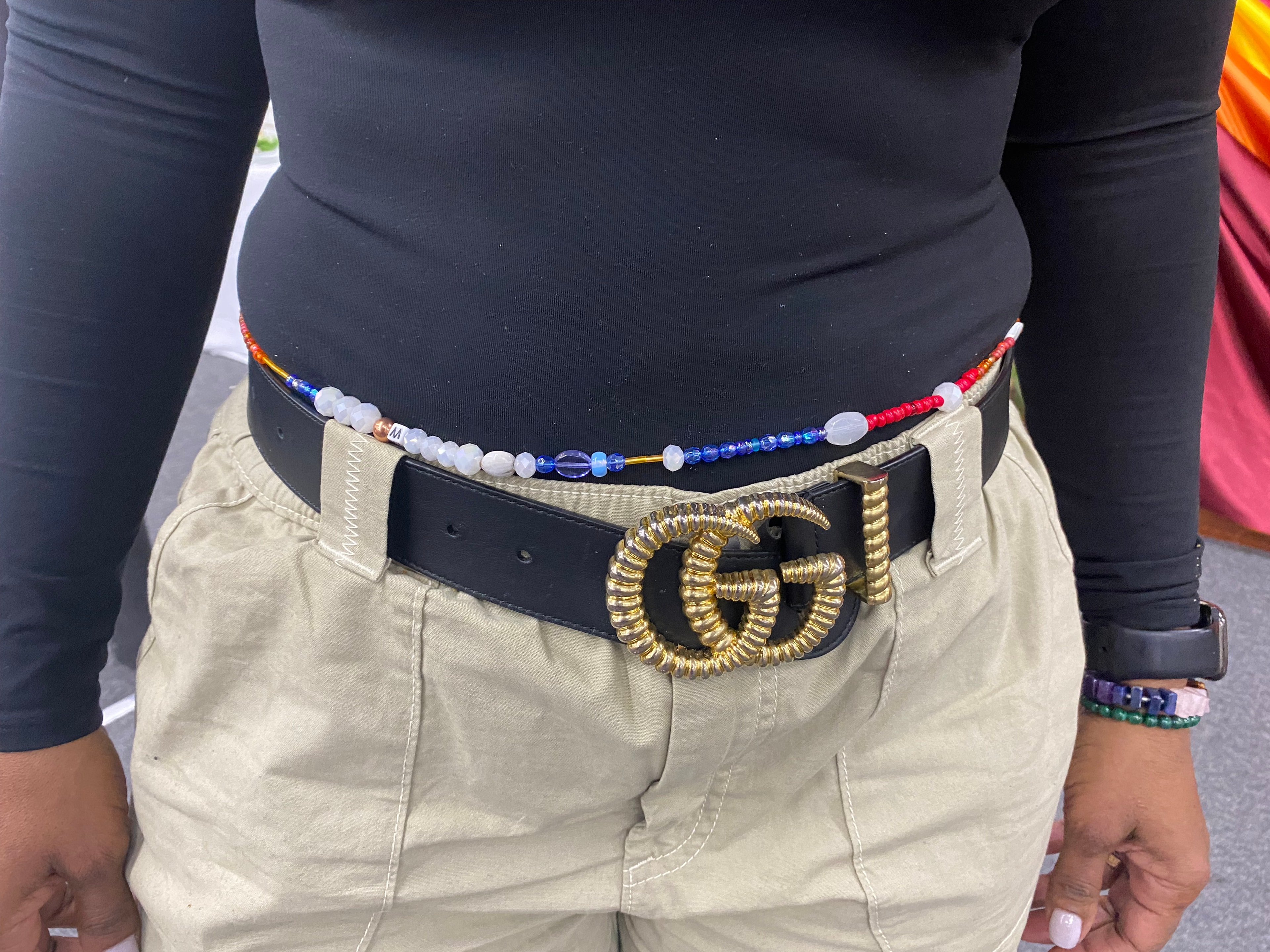 Close-up of waistbeads worn around the waist.
